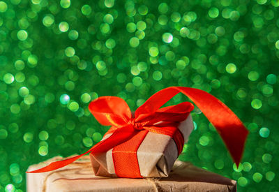 Close-up of christmas decorations on green box