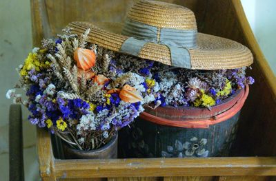 Close-up of flowers in basket on table