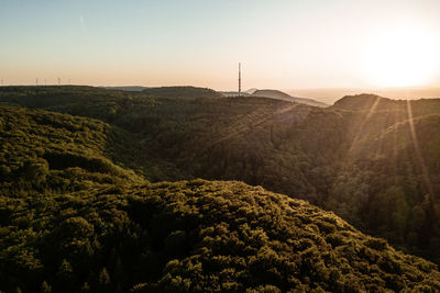 Scenic view of landscape against sky during sunset