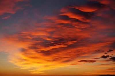 Low angle view of dramatic sky during sunset