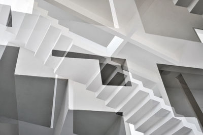 Low angle view of white staircase at home