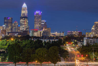 Illuminated buildings in city at night, downtown charlotte north carolina 