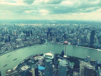 High angle view of buildings against sky in city