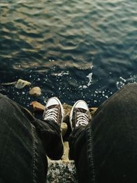 Low section of woman in water