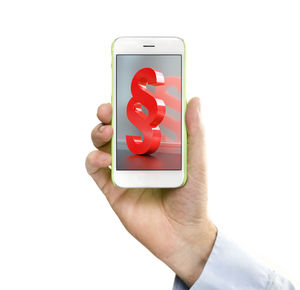 Close-up of hand holding smart phone over white background