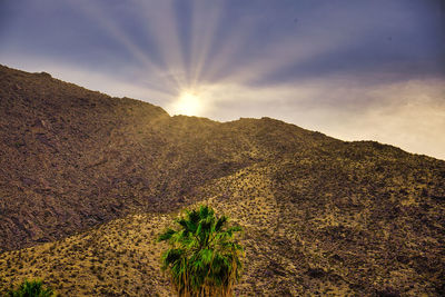 Scenic view of mountains against sky during sunset