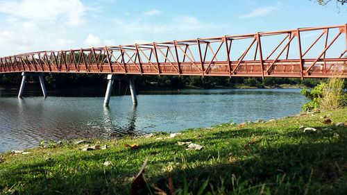 Bridge over river against sky