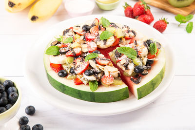 Close-up of salad in plate on table