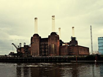 Industrial buildings against sky