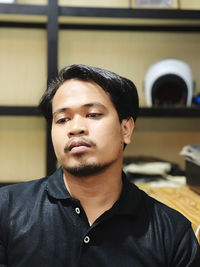 Portrait of young man looking away