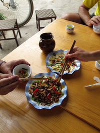 High angle view of people eating food