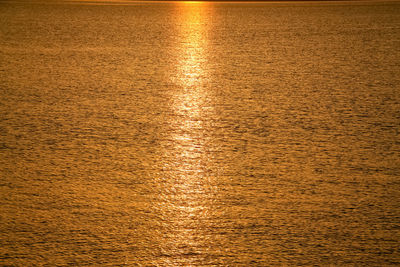 Reflection of water in sea during sunset
