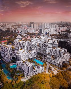 High angle view of city buildings during sunset