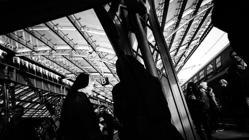 Low angle view of man standing in city