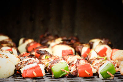 Close-up of meat on barbecue grill