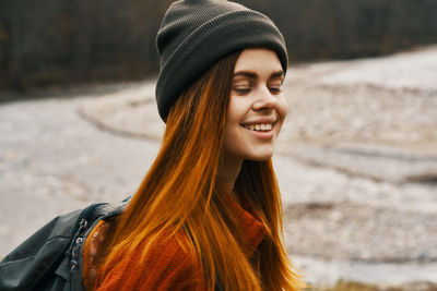 Portrait of smiling young woman