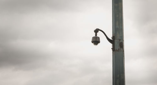 Low angle view of street light against sky