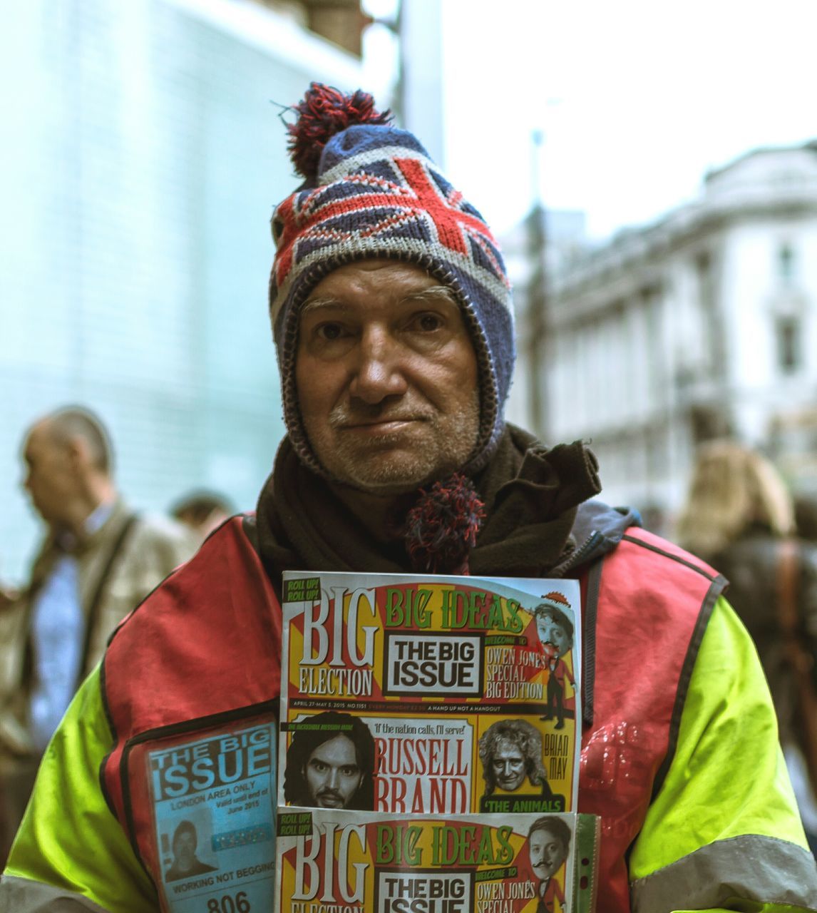 focus on foreground, portrait, looking at camera, front view, close-up, human representation, person, smiling, building exterior, young men, young adult, built structure, architecture, headshot, incidental people, lifestyles, day