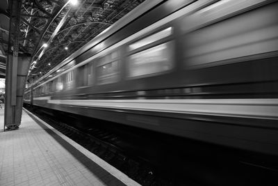 Blurred motion of train at railroad station at night