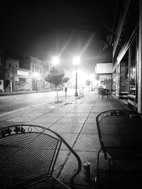 Illuminated street lights at night