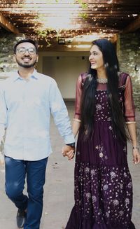 Young couple standing outdoors