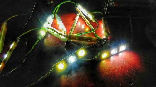 Low angle view of illuminated lights