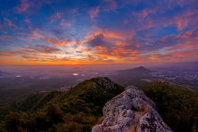 Scenic view of mountains against sky during sunset