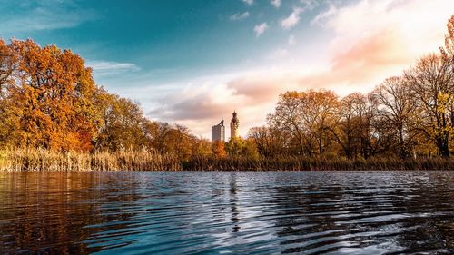 Scenic view of lake against sky during sunset
