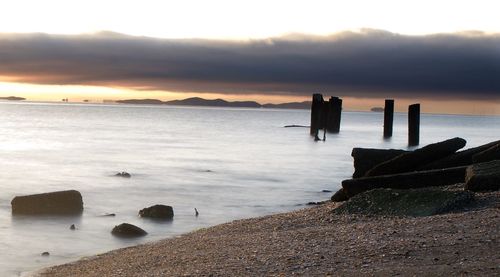 Scenic view of sea against sky during sunset