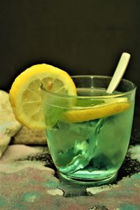 Close-up of cocktail in glass on table