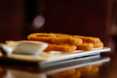 Close-up of bread in plate on table