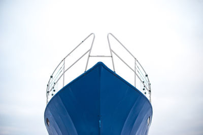 Low angle view of ship's bow against clear sky