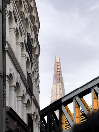 Low angle view of shard behind bridge at golden hour / sunset