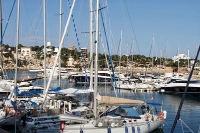 Boats moored at harbor