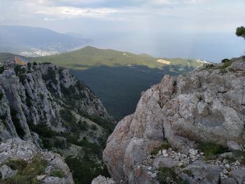 Scenic view of rocky mountains against sky