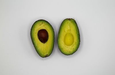 Close-up of fruits against white background