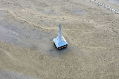 High angle view of umbrella on beach