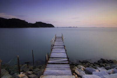 Old pier leading to sea