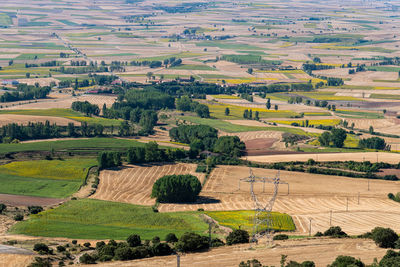 High angle view of farmland with fields for sunflower cultivation. summer time, la bureba, burgos