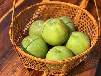 High angle view of pomelo in basket