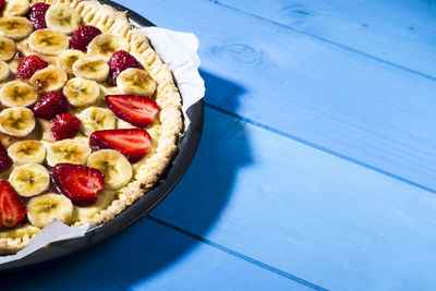 Close-up of tart in container on table