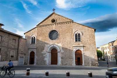 Facade of historic building against sky