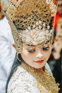 Close-up portrait of woman wearing mask