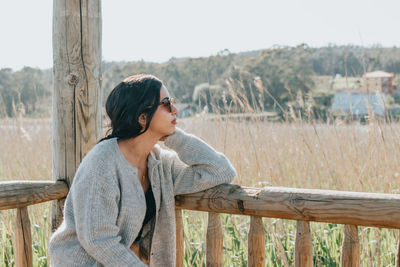 Portrait of young woman looking away