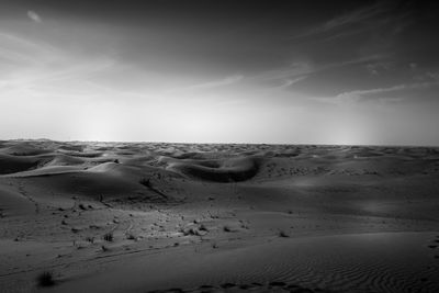 Scenic view of desert against sky