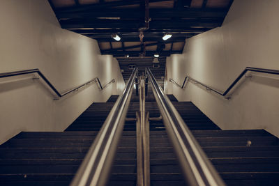 Low angle view of escalator at subway station