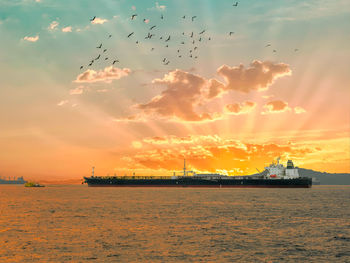 Scenic view of sea against sky during sunset