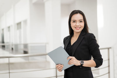 Portrait of a smiling young woman