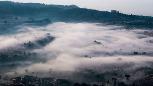 Aerial view of mountains against sky