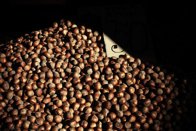 Close-up of coffee beans against black background